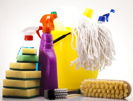 Cleaner preparing storage cupboards during a Bayswater move in clean